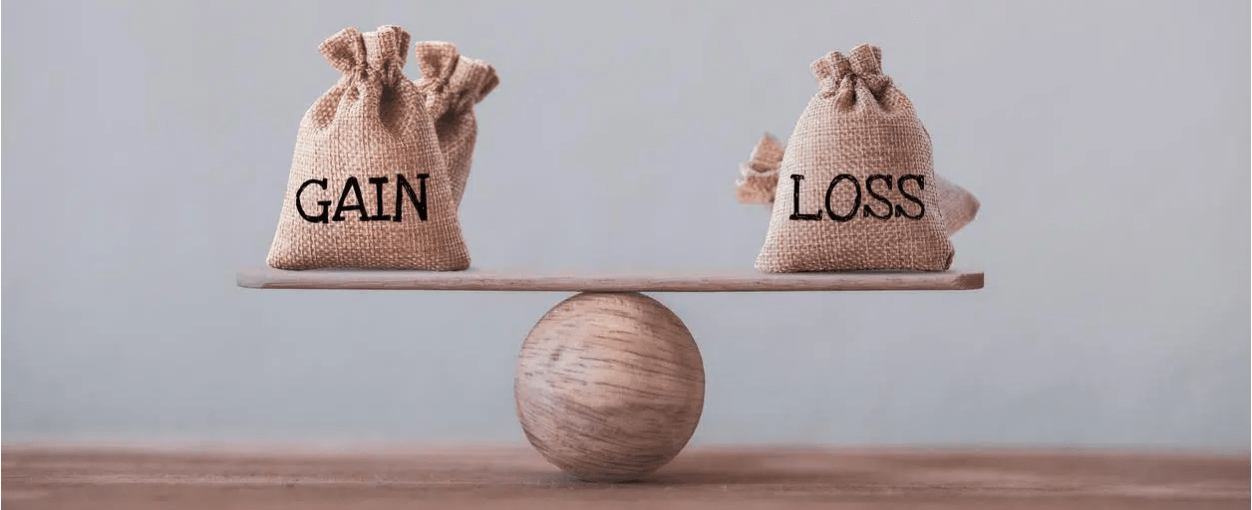 Gain and loss bags balancing on a scale - a simple guide to Capital Gains Tax